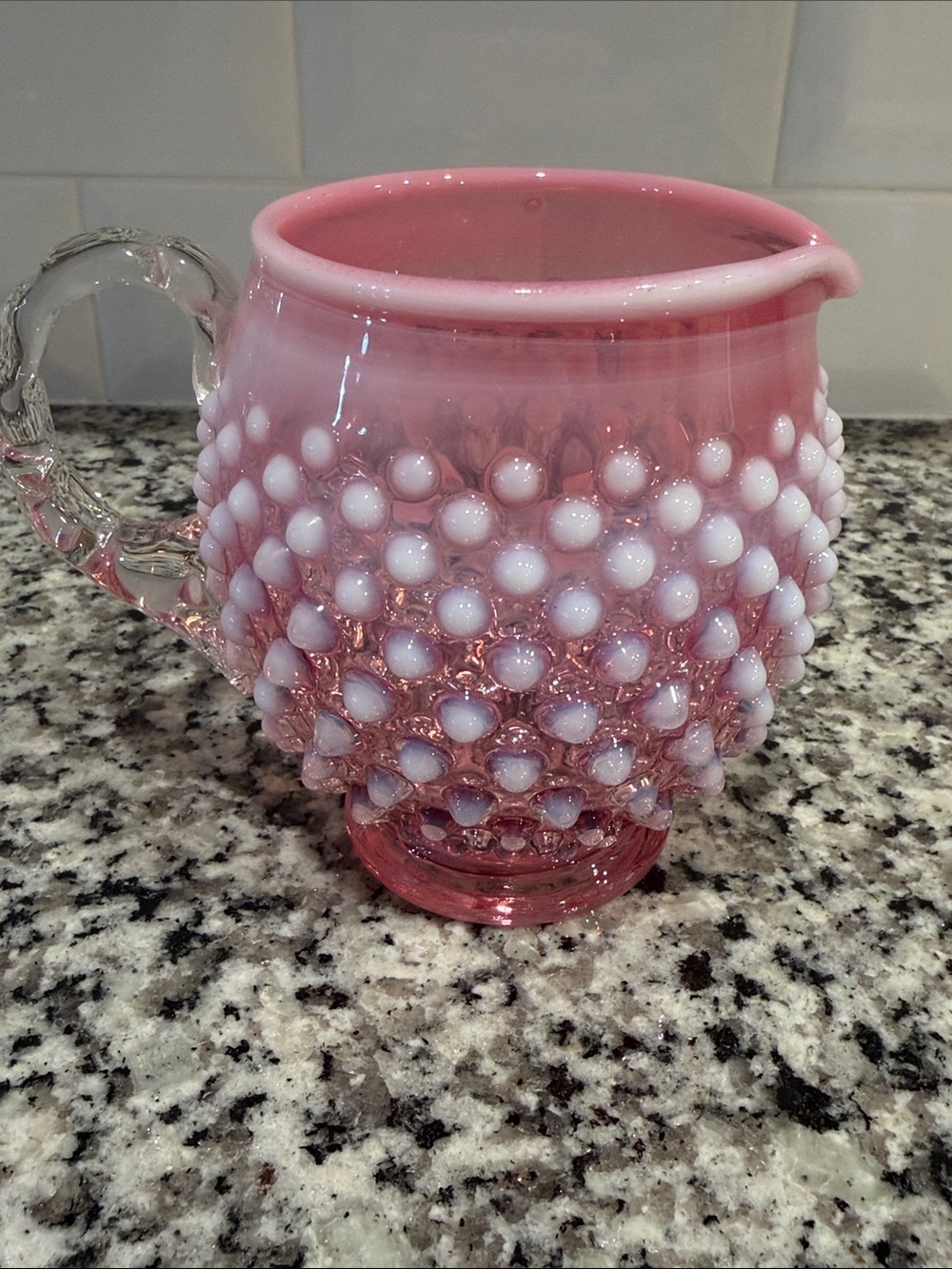 Fenton Cranberry Opalescent
Hobnail glass pitcher